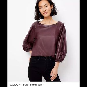 Faux leather balloon sleeve top by Loft